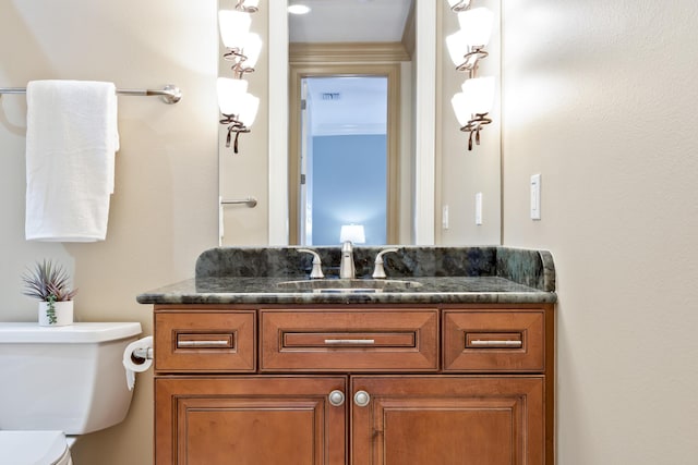 671 Indian River Dr, Melbourne, FL 32935 - half bathroom with vanity and toilet
