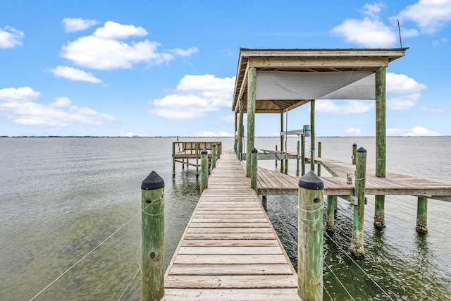 671 Indian River Dr, Melbourne, FL 32935 - dock area featuring a water view and boat lift