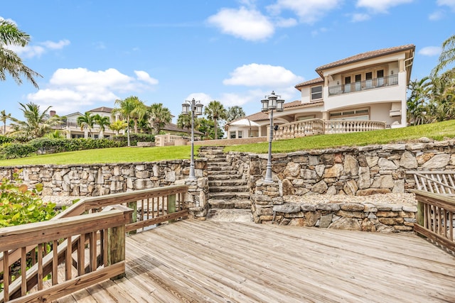 671 Indian River Dr, Melbourne, FL 32935 - wooden terrace with a lawn