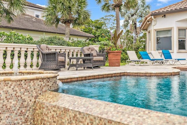 671 Indian River Dr, Melbourne, FL 32935 - view of swimming pool featuring a patio and a pool with connected hot tub