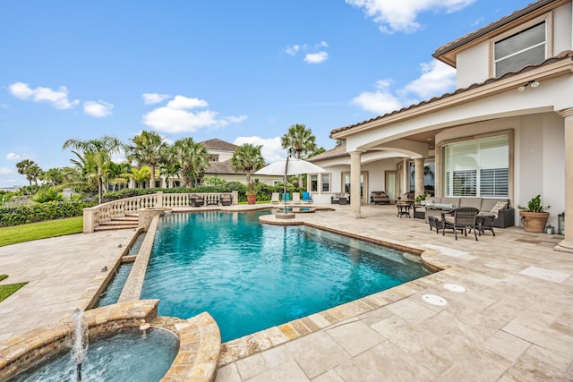671 Indian River Dr, Melbourne, FL 32935 - view of pool featuring an outdoor hangout area, a patio, and a pool with connected hot tub