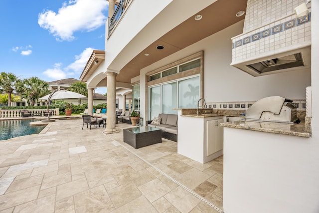 671 Indian River Dr, Melbourne, FL 32935 - view of patio / terrace with an outdoor kitchen and outdoor lounge area