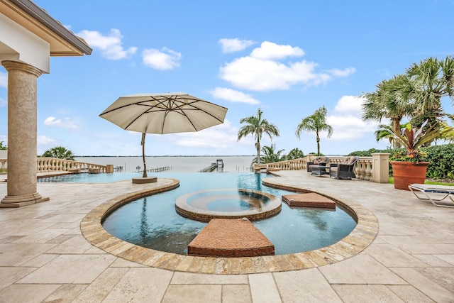 671 Indian River Dr, Melbourne, FL 32935 - view of swimming pool with a patio and a pool with connected hot tub