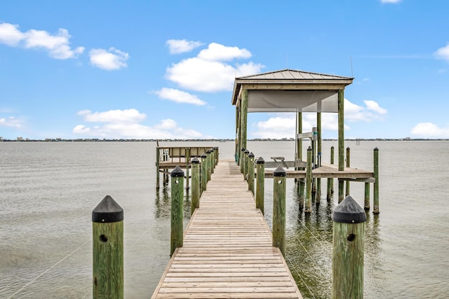 671 Indian River Dr, Melbourne, FL 32935 - dock with a water view and boat lift