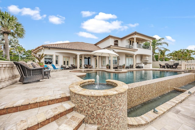 671 Indian River Dr, Melbourne, FL 32935 - view of swimming pool with an outdoor living space, a patio area, exterior kitchen, and outdoor dining area