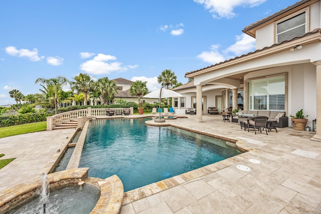671 Indian River Dr, Melbourne, FL 32935 - view of swimming pool with outdoor lounge area, a patio, and a pool with connected hot tub