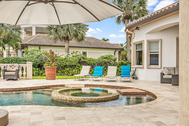 671 Indian River Dr, Melbourne, FL 32935 - view of pool featuring a patio area and a pool with connected hot tub
