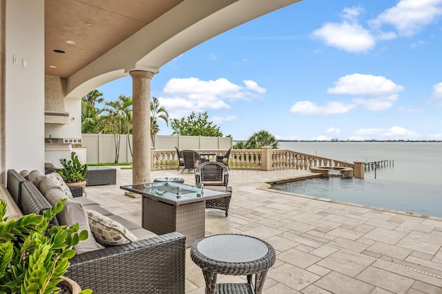 671 Indian River Dr, Melbourne, FL 32935 - view of patio with an outdoor hangout area, a water view, and outdoor dining area