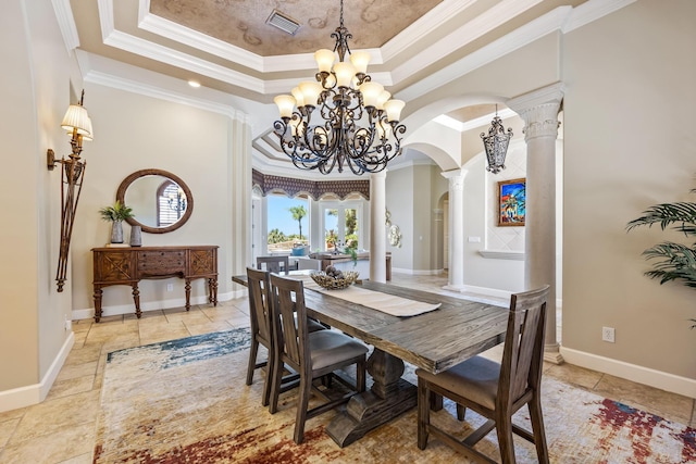 671 Indian River Dr, Melbourne, FL 32935 - dining space with a tray ceiling, arched walkways, a chandelier, ornamental molding, and ornate columns