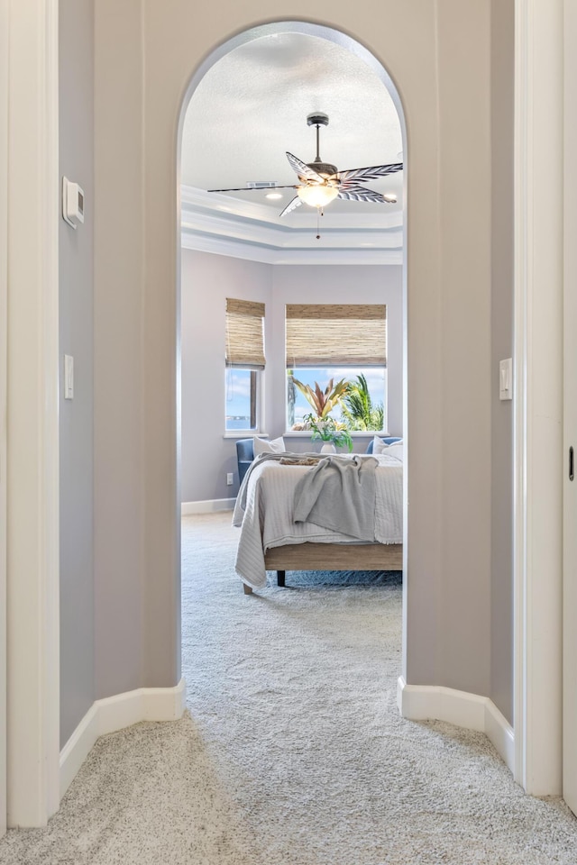 671 Indian River Dr, Melbourne, FL 32935 - carpeted bedroom featuring arched walkways and ceiling fan