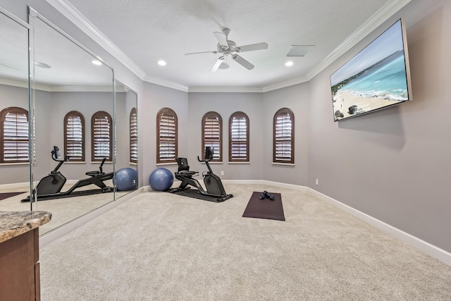 671 Indian River Dr, Melbourne, FL 32935 - exercise room featuring carpet flooring, a ceiling fan, recessed lighting, healthy amount of natural light, and crown molding