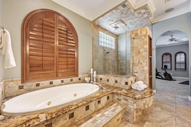 671 Indian River Dr, Melbourne, FL 32935 - full bathroom with a whirlpool tub, tiled shower, ornamental molding, and ceiling fan