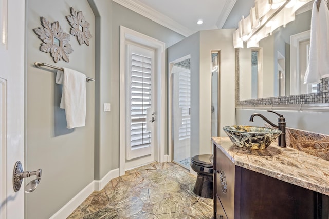 671 Indian River Dr, Melbourne, FL 32935 - bathroom featuring marble finish floors, ornamental molding, vanity, and plenty of natural light