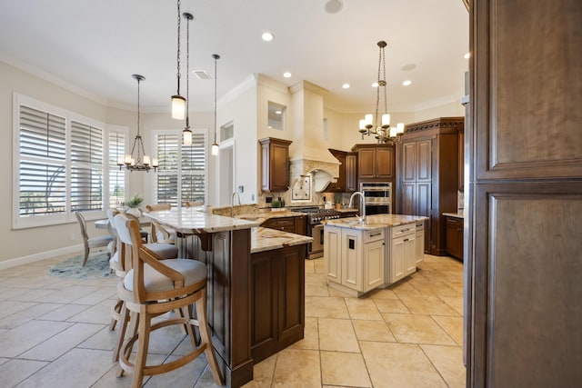 671 Indian River Dr, Melbourne, FL 32935 - kitchen featuring a chandelier, appliances with stainless steel finishes, light stone counters, custom exhaust hood, and backsplash