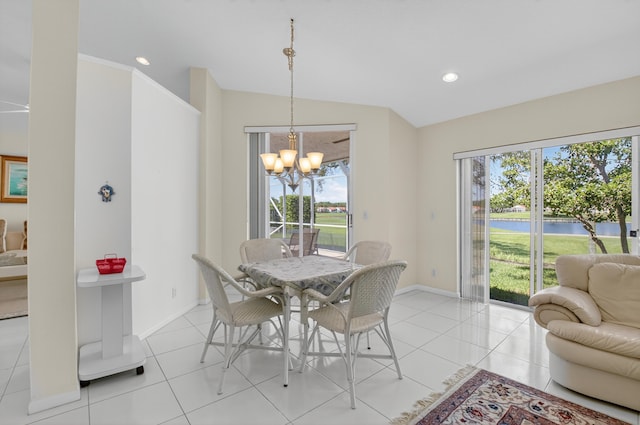 17213 Balboa Point Way, Boca Raton, FL 33487 - dining room featuring healthy amount of natural light, a chandelier, light tile patterned floors, lofted ceiling, and recessed lighting