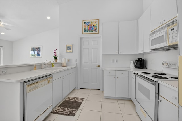 17213 Balboa Point Way, Boca Raton, FL 33487 - kitchen with white appliances, a peninsula, light countertops, ceiling fan, and light tile patterned floors