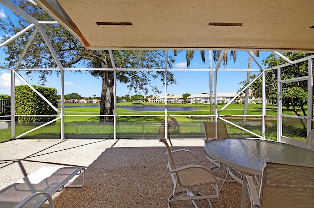 17213 Balboa Point Way, Boca Raton, FL 33487 - sunroom featuring a water view, golf course view, a residential view, and outdoor dining area