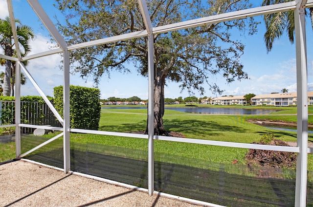 17213 Balboa Point Way, Boca Raton, FL 33487 - unfurnished sunroom featuring a water view