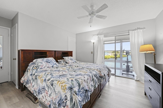 2800 Indian River Blvd Unit 7T, Vero Beach, FL 32960 - bedroom with access to exterior, light wood-style flooring, a water view, and ceiling fan