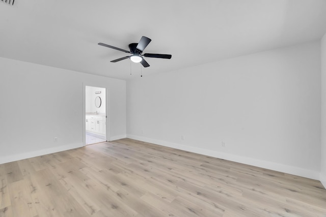 2432 SE Floresta Dr, Port Saint Lucie, FL 34984 - spare room with light wood-style flooring and ceiling fan