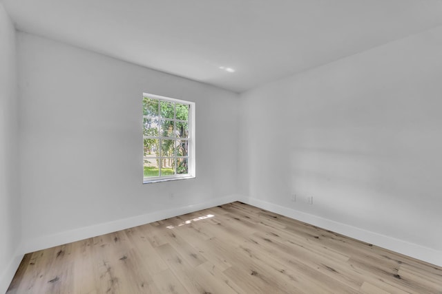 2432 SE Floresta Dr, Port Saint Lucie, FL 34984 - empty room with wood finished floors and baseboards