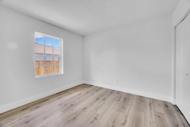 2432 SE Floresta Dr, Port Saint Lucie, FL 34984 - spare room with baseboards and light wood-type flooring