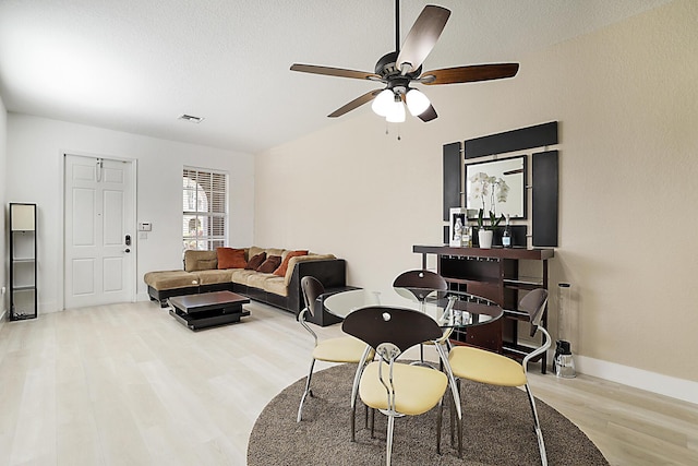 6964 Julia Gardens Dr, Coconut Creek, FL 33073 - dining room featuring wood finished floors and ceiling fan