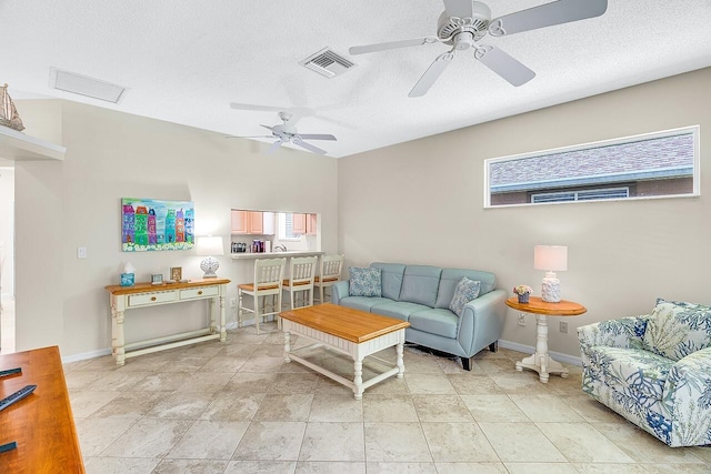 420 Hawthorne Ln, Vero Beach, FL 32962 - living room with ceiling fan and a textured ceiling