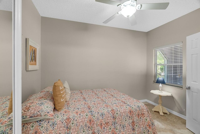420 Hawthorne Ln, Vero Beach, FL 32962 - bedroom featuring light tile patterned floors and a ceiling fan