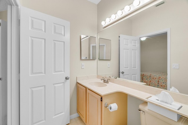 420 Hawthorne Ln, Vero Beach, FL 32962 - bathroom featuring vanity and toilet