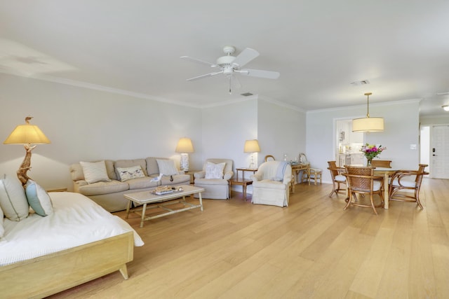 300 Intracoastal Pl Unit 204, Jupiter, FL 33469 - living room featuring light wood-style flooring, crown molding, and ceiling fan