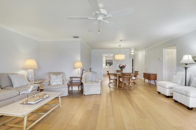 300 Intracoastal Pl Unit 204, Jupiter, FL 33469 - living area with light wood-type flooring, crown molding, and ceiling fan