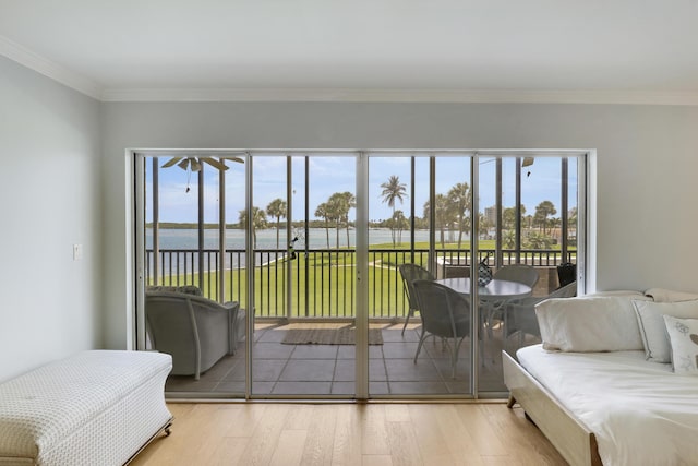 300 Intracoastal Pl Unit 204, Jupiter, FL 33469 - bedroom with access to exterior, wood finished floors, a water view, and crown molding