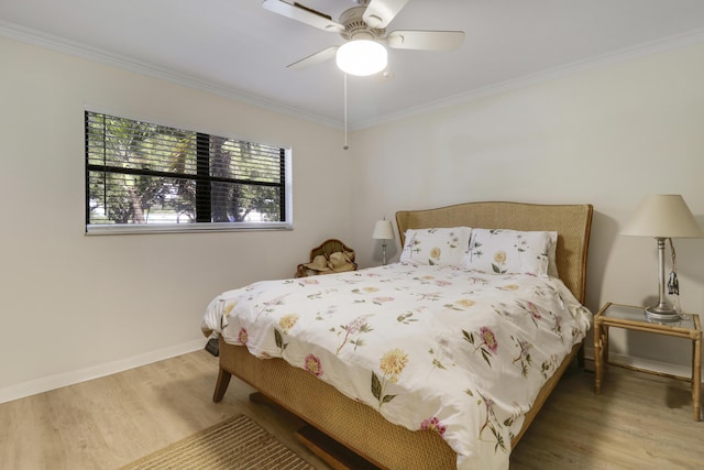 300 Intracoastal Pl Unit 204, Jupiter, FL 33469 - bedroom with wood finished floors, crown molding, and ceiling fan