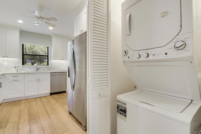300 Intracoastal Pl Unit 204, Jupiter, FL 33469 - laundry room featuring estacked washer and dryer, light wood-style floors, recessed lighting, and a ceiling fan