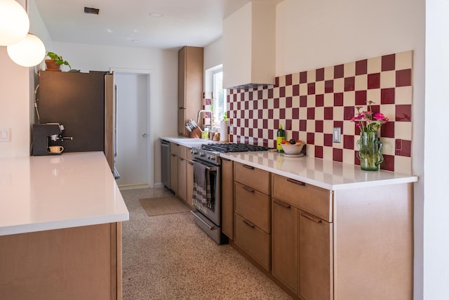 2931 SE Morningside Blvd, Port Saint Lucie, FL 34952 - kitchen featuring appliances with stainless steel finishes, decorative backsplash, light countertops, and brown cabinetry