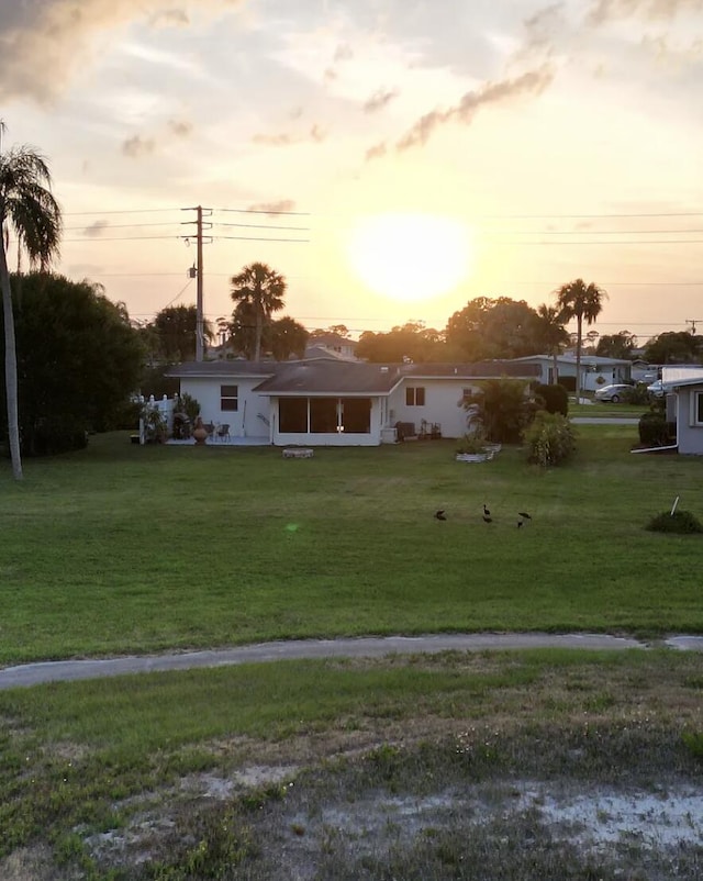 2931 SE Morningside Blvd, Port Saint Lucie, FL 34952 - view of front of property with a yard