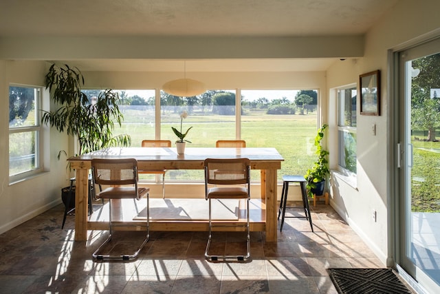2931 SE Morningside Blvd, Port Saint Lucie, FL 34952 - sunroom / solarium featuring healthy amount of natural light and stone finish flooring
