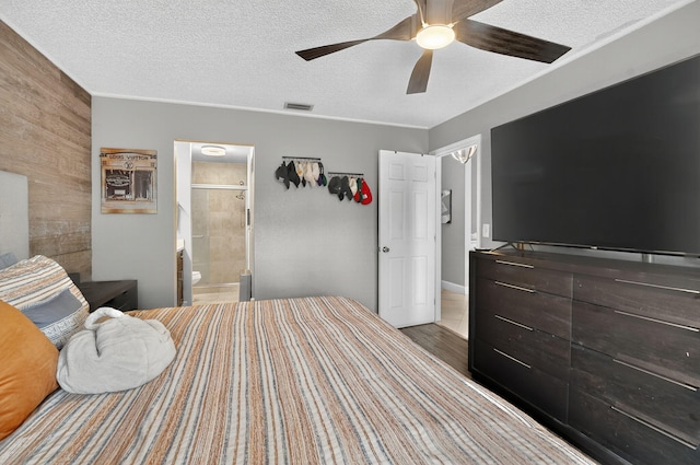 1005 NW 53rd St, Deerfield Beach, FL 33064 - bedroom with a textured ceiling, a ceiling fan, and connected bathroom