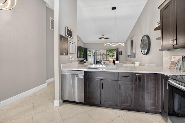 1005 NW 53rd St, Deerfield Beach, FL 33064 - kitchen featuring dishwasher, a ceiling fan, range with electric cooktop, light countertops, and vaulted ceiling