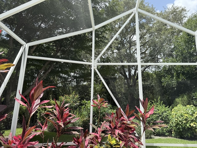 404 NE Ginger Lily Place, Saint Lucie, FL 34983 - view of patio featuring a ceiling fan and outdoor dining area
