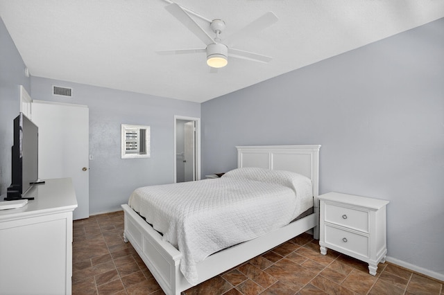 28 Yacht Club Dr Unit 409, North Palm Beach, FL 33408 - bedroom with stone finish floors and ceiling fan
