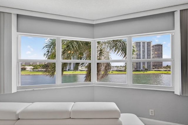 28 Yacht Club Dr Unit 409, North Palm Beach, FL 33408 - sitting room featuring a water view