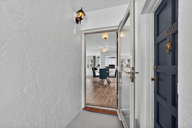 28 Yacht Club Dr Unit 409, North Palm Beach, FL 33408 - view of exterior entry with stucco siding