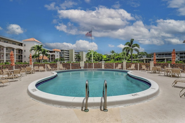 28 Yacht Club Dr Unit 409, North Palm Beach, FL 33408 - community pool with a patio area