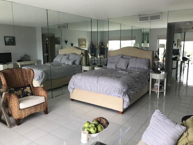 2600 N Flagler Dr Unit Ph13, West Palm Beach, FL 33407 - tiled bedroom with multiple windows