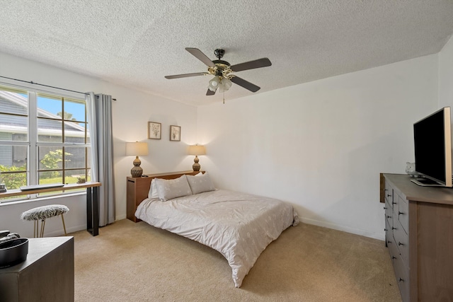 3809 Island Club Cir E, Lake Worth, FL 33462 - bedroom with light carpet, a textured ceiling, and a ceiling fan