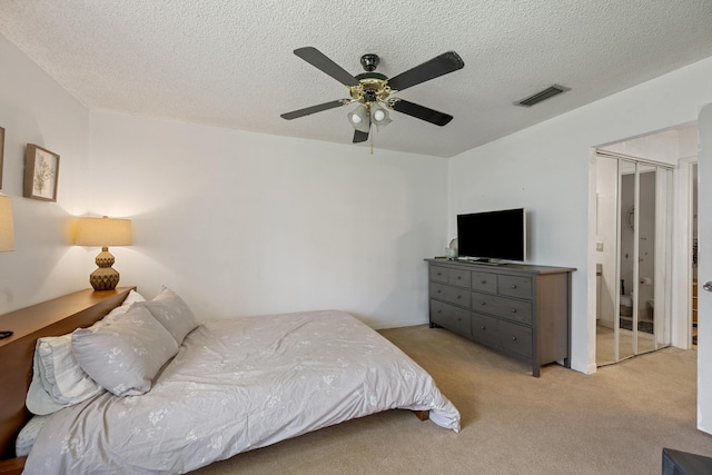 3809 Island Club Cir E, Lake Worth, FL 33462 - bedroom featuring light carpet, a textured ceiling, and ceiling fan