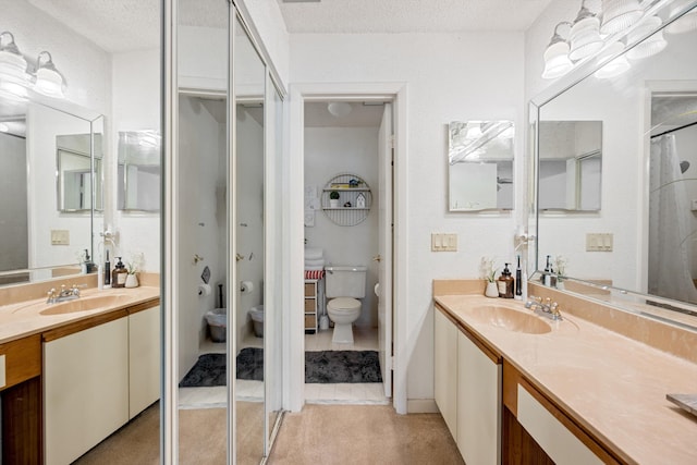 3809 Island Club Cir E, Lake Worth, FL 33462 - full bathroom featuring vanity and a textured ceiling