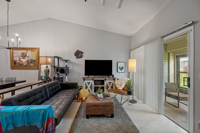 3809 Island Club Cir E, Lake Worth, FL 33462 - tiled living area with lofted ceiling, a chandelier, and a textured ceiling
